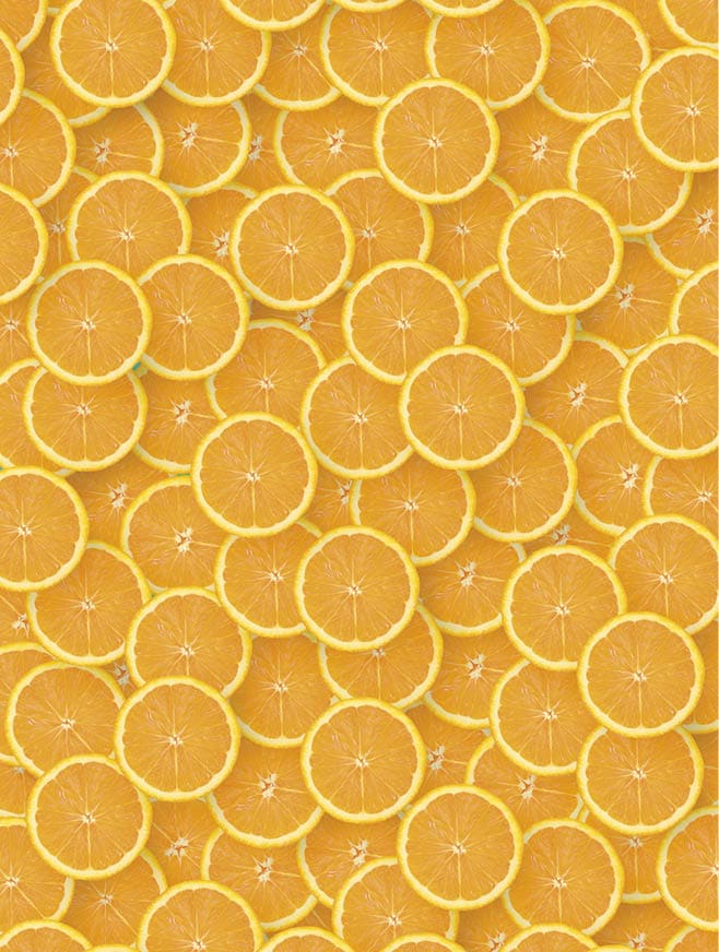 Top view of many orange fruit slices as a background image. A saturated citrus pattern. Flat lay